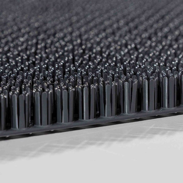 Detailaufnahme einer Fußmatte mit Noppen