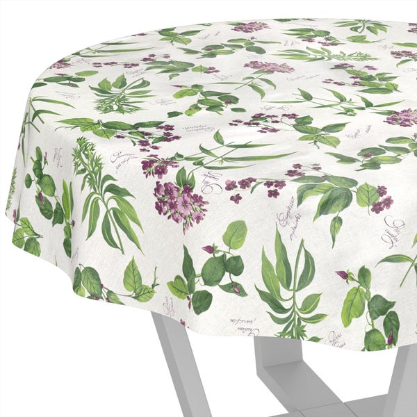 Rundes Tischtuch mit botanischem Print aus grünen Blättern, violetten Blüten und Zierschrift auf hellem Stoff.
