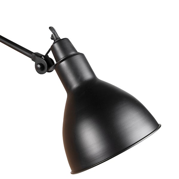 Nahaufnahme einer schwarzen Schreibtischlampe mit verstellbarem Arm