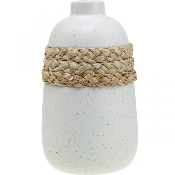 Keramikvase mit geflochtenem Dekoband aus Naturmaterial.