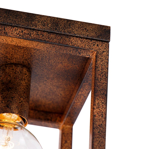 Detailansicht einer würfelförmigen Deckenleuchte mit Metalleinfassung