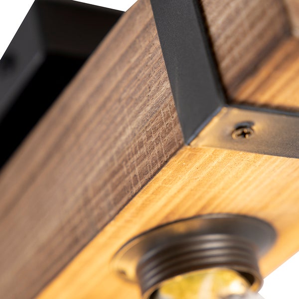 Detailansicht einer Deckenleuchte aus Holz und Metall
