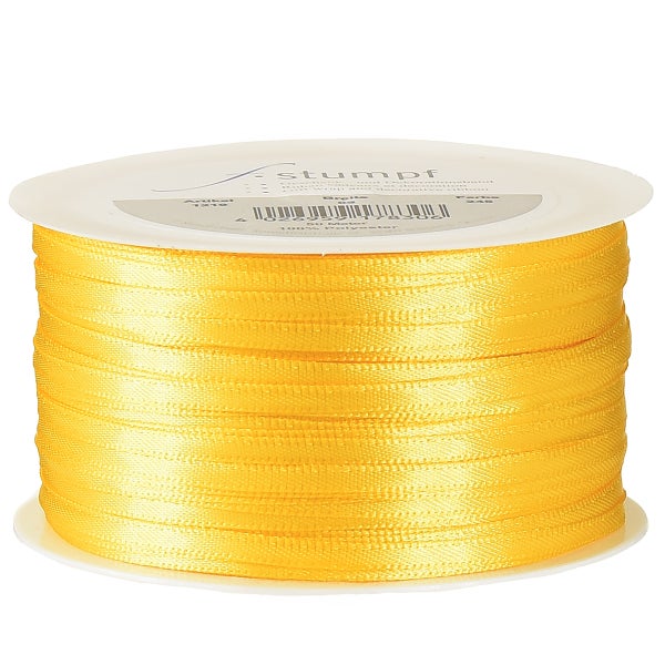 Gelbes Geschenkband aus Polyester auf einer Spule