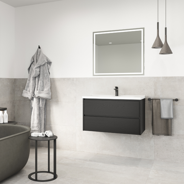 Modernes Badezimmer mit Waschtischunterschrank in Holzoptik, Waschbecken, beleuchtetem Spiegel, Badewanne und minimalistischen Hängeleuchten.
