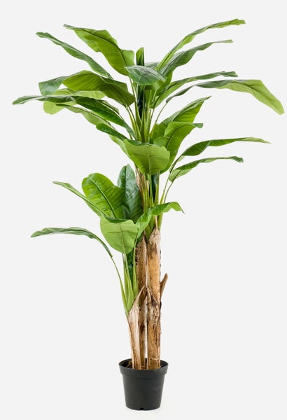 Künstliche Bananenstaude mit grünen Blättern und braunem Stamm in einem schwarzen Topf.
