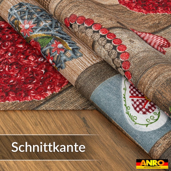 Patchwork-Tischdecke mit rustikalem Muster und Detailansicht der Schnittkante. ANRO Logo.