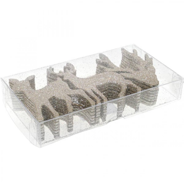 Dekorative Hirschfiguren mit Glitzer in einer transparenten Verpackung.