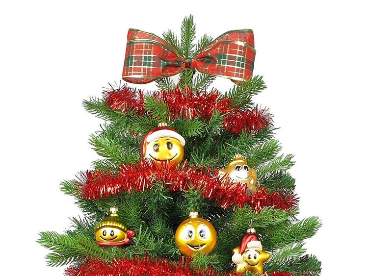 Weihnachtsbaumspitze mit Karoschleife dekoriert mit Lametta und Emoji Weihnachtskugeln