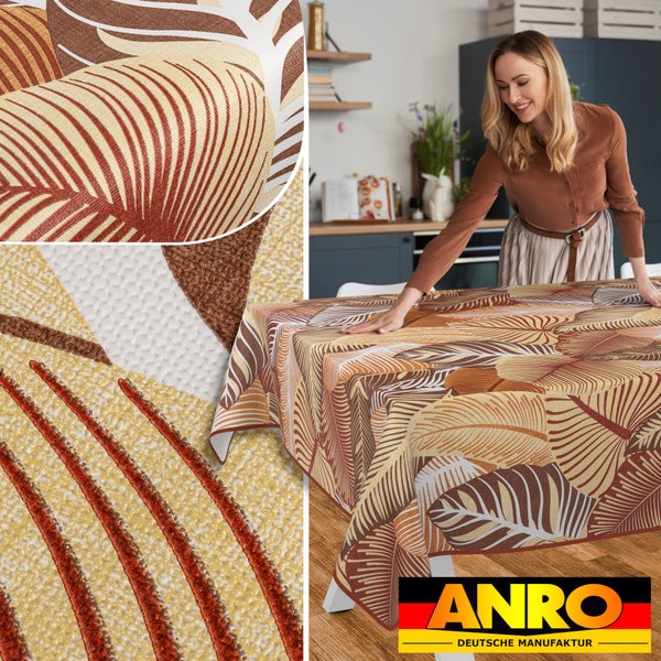 Tischdekoration mit Blättermuster und ANRO Logo