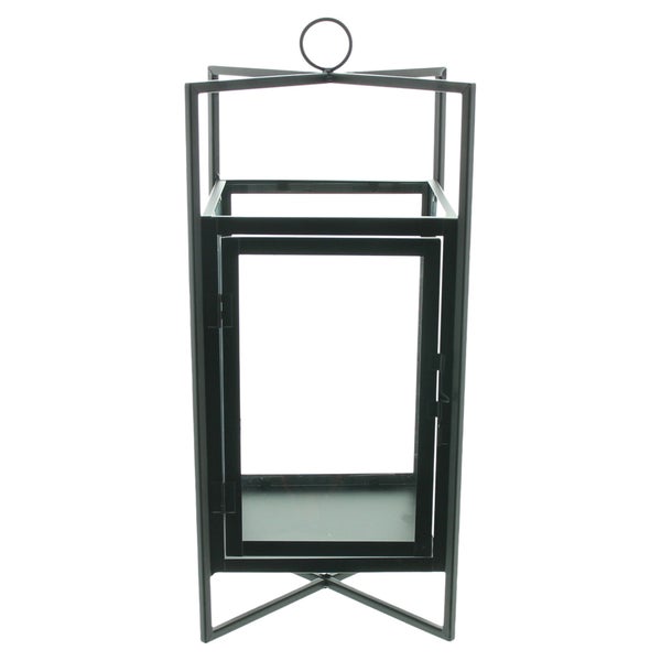 Schwarze Laterne aus Metall und Glas mit geometrischem Rahmen.