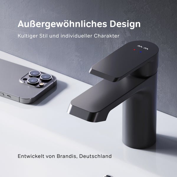 Moderne Waschtischarmatur in minimalistischem Design neben einem Smartphone auf einem Waschbecken.