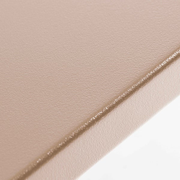 Zylindrischer Möbelfuß mit beigefarbener strukturierter Oberfläche und schwarzer Schutzkappe.