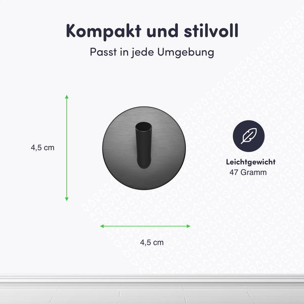 Kompakter schwarzer Wandhaken mit kreisförmiger Basis, Durchmesser 4,5 Zentimeter und Gewicht 47 Gramm.