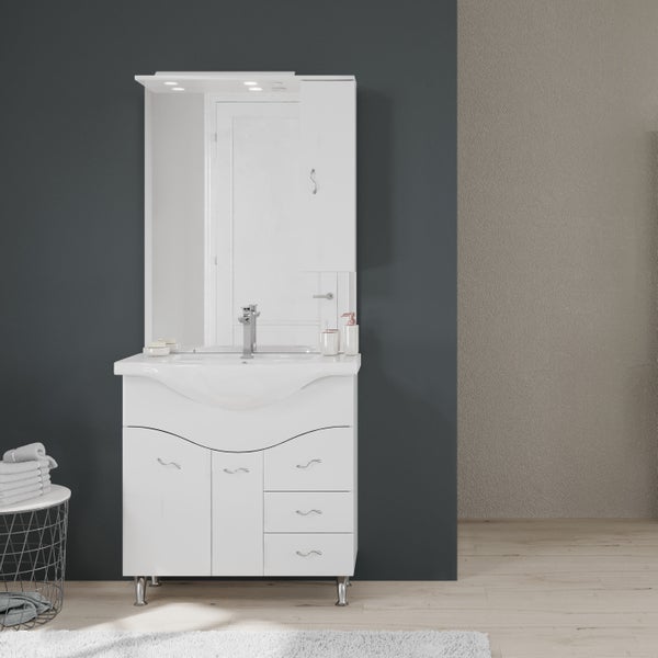 Modernes Badezimmermöbel-Set in Weiß, bestehend aus Waschbecken, Unterschrank mit geschwungenen Fronten und Spiegelschrank mit Beleuchtung.