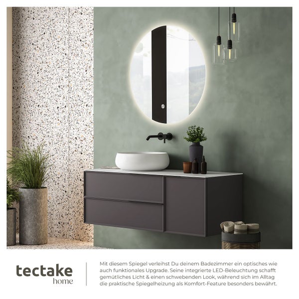 Modernes Badezimmer mit Waschtischunterschrank, Aufsatzwaschbecken und beleuchtetem Spiegel