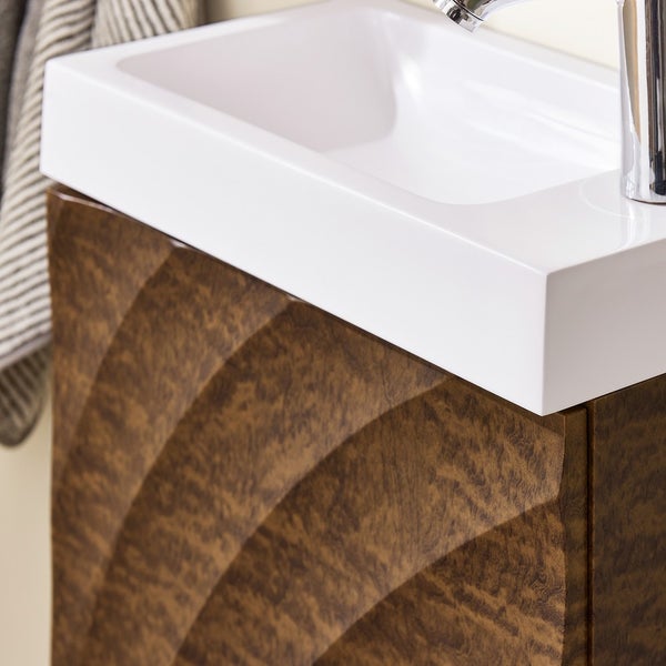 Detailaufnahme eines Waschbeckens mit Unterschrank im Badezimmer