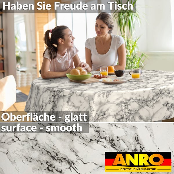Frau und Kind an einem runden Tisch mit glatter Tischdecke im Marmor-Design in einem hellen Zimmer. ANRO Logo.