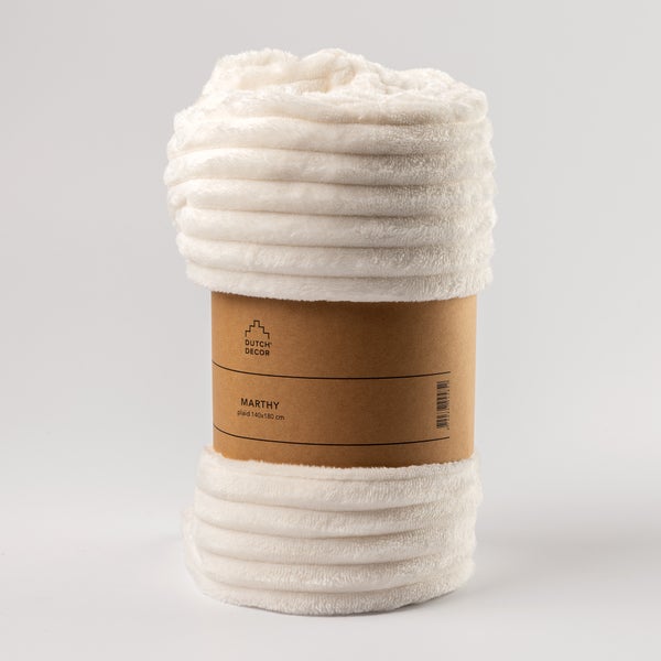Gerollte Kuscheldecke mit Papierbanderole
