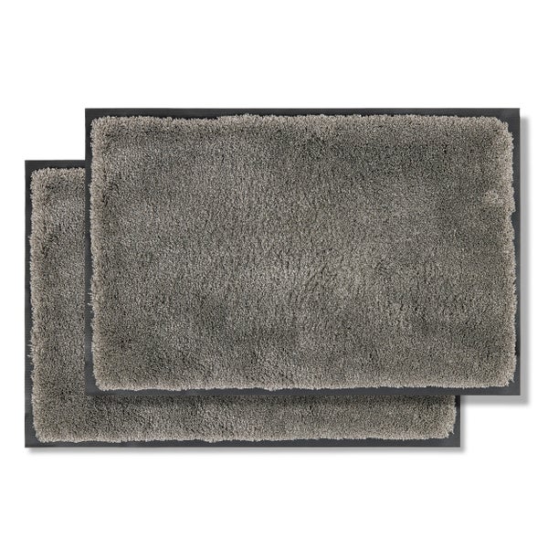 Zwei graue Badematten mit rechteckiger Form und Textur