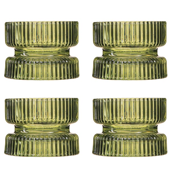 Vier lila Teelichthalter aus geriffeltem Glas.