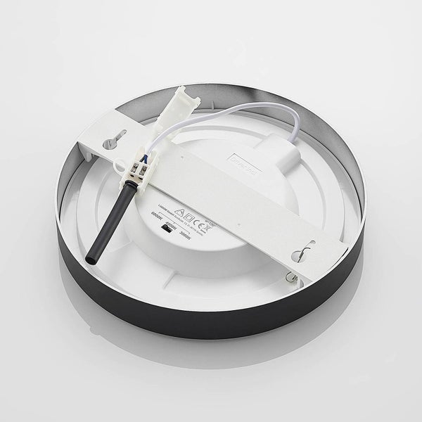 Rückseite einer runden LED Deckenleuchte mit Montagebügel, Anschlusskabel und Farbtemperaturschalter für 3000, 4000 und 6000 Kelvin.