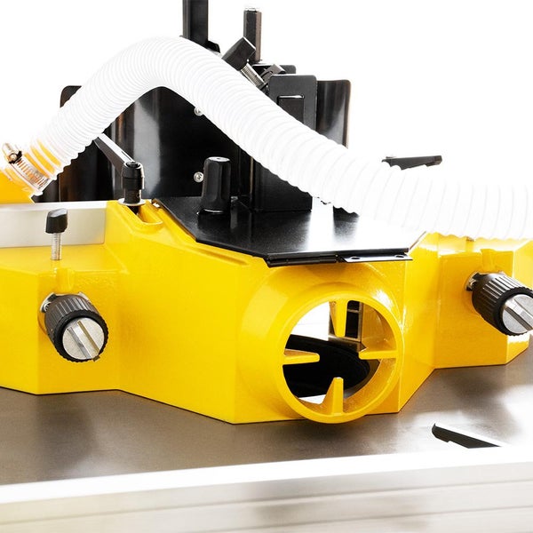 Detailansicht einer gelben Tischfräse mit Absaugvorrichtung