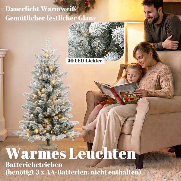 Künstlicher Weihnachtsbaum mit Schnee und 50 warmweißen LED Lichtern batteriebetrieben für eine weihnachtliche Stimmung im Wohnzimmer.