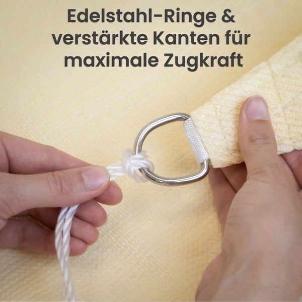 Sonnensegel-Ecke mit Edelstahl-D-Ring und verstärkter Kante, Seil an Ring befestigt.