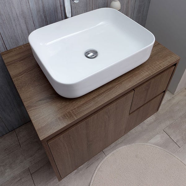 Badezimmer mit Aufsatzwaschbecken auf Waschtischunterschrank