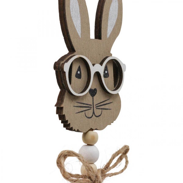 Dekorativer Osterhase aus Holz mit Brille und Kordelaufhängung