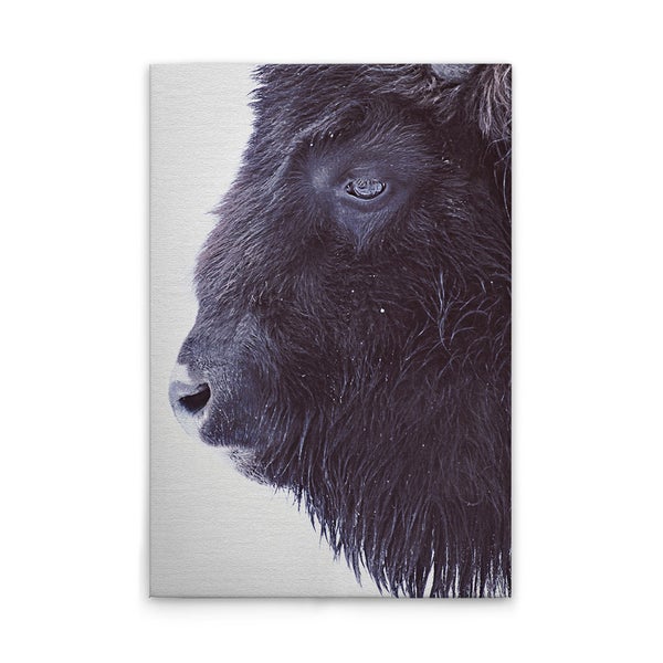 Leinwandbild mit dem Porträt eines Büffels im Hochformat