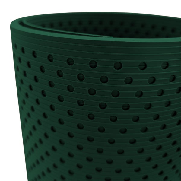 Grüne Lochmatte auf einer Rolle