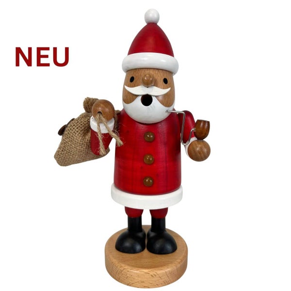 Weihnachtsräuchermann aus Holz in Form eines Weihnachtsmanns mit Geschenksack und Pfeife als Weihnachtsdekoration.