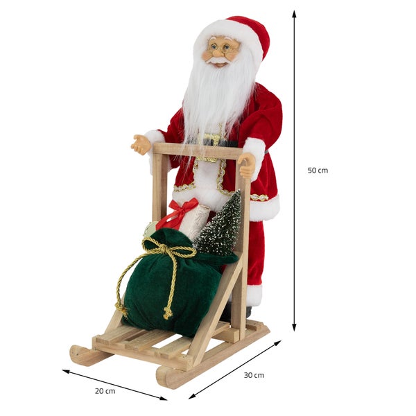 ECD Germany Weihnachtsmann-Figur stehend auf Schlitten, 30x20x50 cm, Polyresin & Holz, Christbaumschmuck Weihnachtsdeko Innen Weihnachtsdekoration Winterdekoration Deko Santa Claus Dekofigur Nikolaus