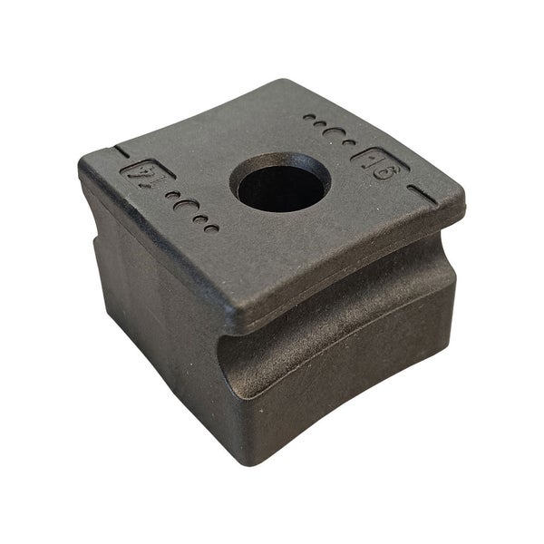 Schwarzer Montageklotz mit Bohrung