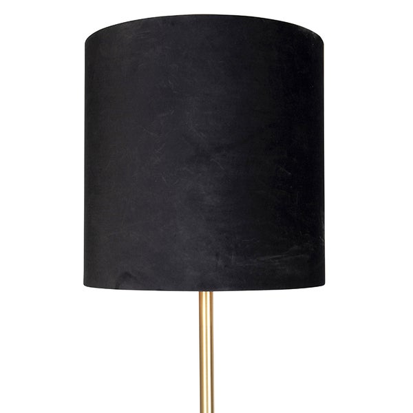 Zylindrischer Lampenschirm aus schwarzem Stoff auf einem goldfarbenen Metallständer.