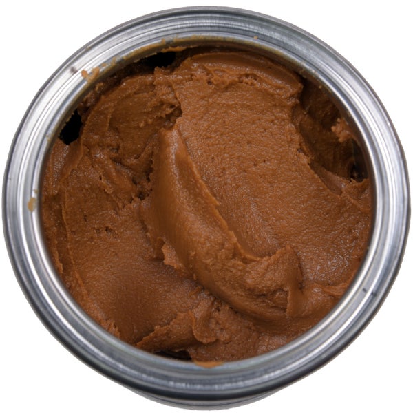 Offene Dose mit Spachtelmasse