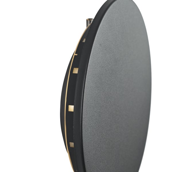 Runde Wandleuchte mit strukturierter Oberfläche und seitlichen Lichtöffnungen