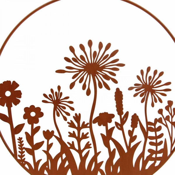 Dekorative Gartendeko mit Blumenmuster in einem runden Rahmen