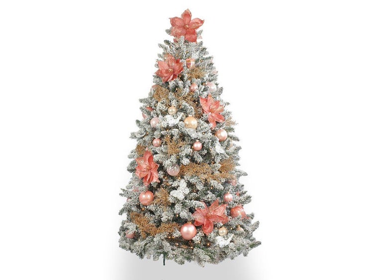Künstlicher, verschneiter Weihnachtsbaum geschmückt mit Kugeln und Blumen in festlichem Design
