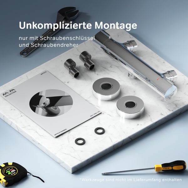 Duscharmatur Set mit Anschlüssen und Bedienungsanleitung auf einer Marmorplatte zur einfachen Montage mit Schraubenschlüssel und Schraubendreher.