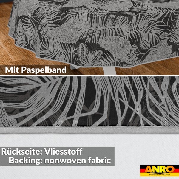 Runde Tischdecke mit tropischem Blattmuster, Paspelband am Rand und Vliesstoff-Rückseite. ANRO Logo.