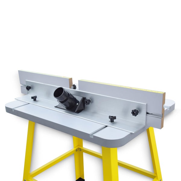 Frästisch mit gelbem Untergestell und Absaugstutzen.