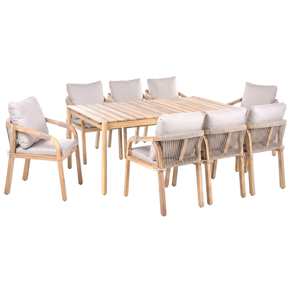 Gartengruppe bestehend aus einem rechteckigen Holztisch und sieben Sesseln mit hellen Kissen und Kordelbespannung an der Rückenlehne.