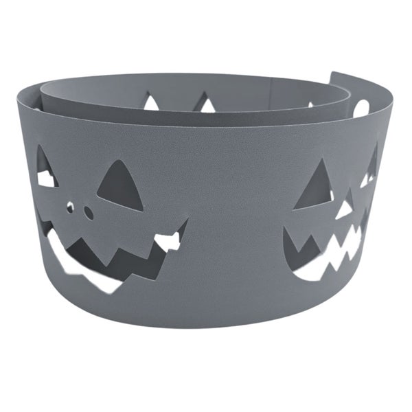 Dekorative Halloween-Schale mit ausgeschnittenen Gesichtern