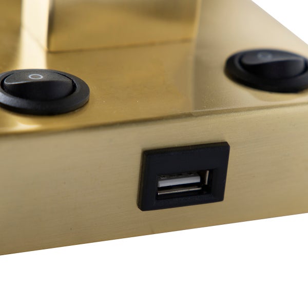 Detailansicht eines metallischen Leuchtensockels mit zwei Schaltern und einem USB Anschluss
