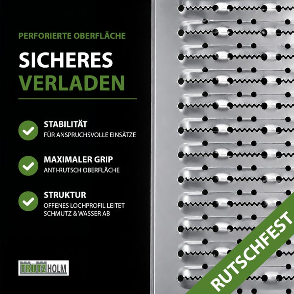 Detailansicht einer Auffahrrampe mit perforierter Oberfläche für rutschfestes Verladen, TrutzHolm Logo.