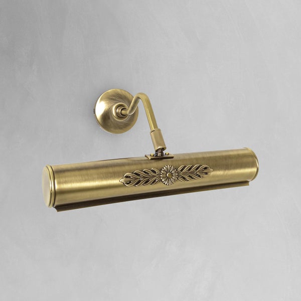 Wandleuchte in Messingoptik mit floralem Dekor