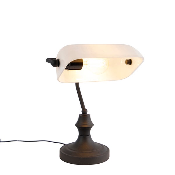 Bankerlampe mit Glühbirne auf einem Tisch