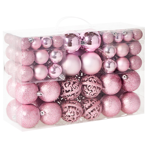 Set aus rosafarbenen Weihnachtskugeln in verschiedenen Größen und Oberflächen wie glitzernd, matt und glänzend in einer Klarsichtbox.